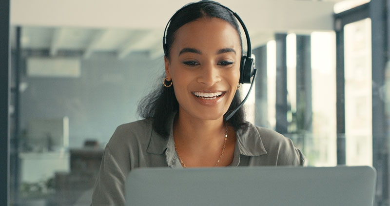 Customer service representative working on the computer